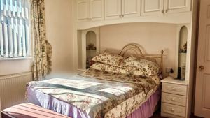 Bedroom One- click for photo gallery